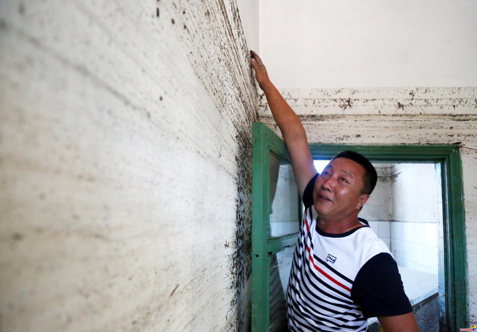 作品：灾后三道湾中心村  内容：2017年7月20日晚，延吉市三道湾镇遭遇洪灾，一些处于低洼地带的村屯水位迅速上涨至2米多深。