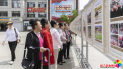“与人民同行”主题摄影美术展走进社区